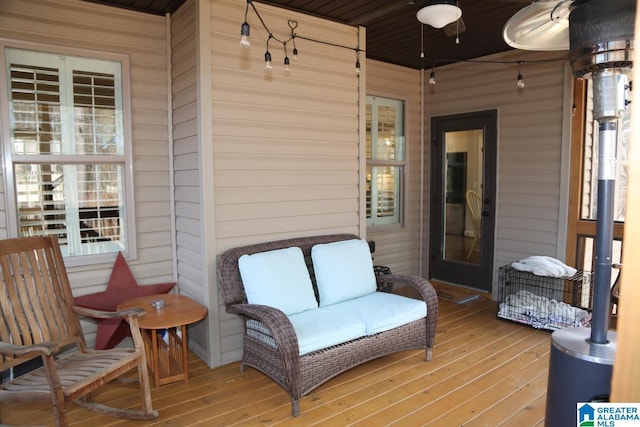 wooden deck with ceiling fan