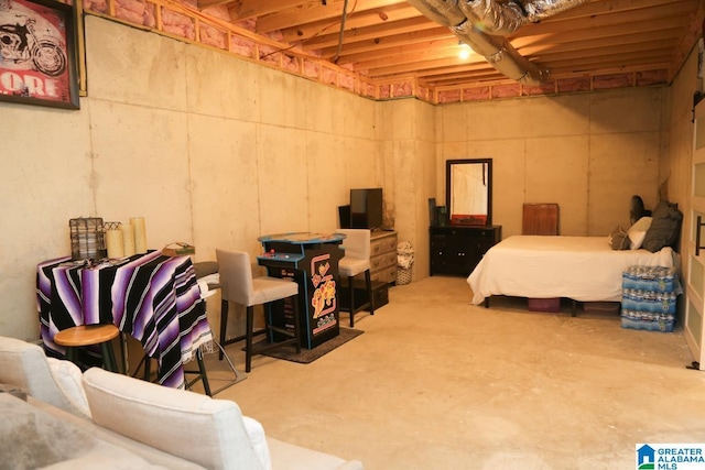 bedroom with concrete flooring