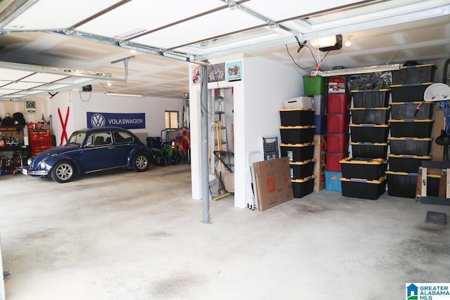 garage featuring a garage door opener