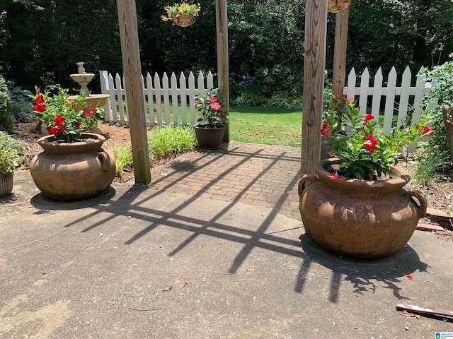 view of patio with fence