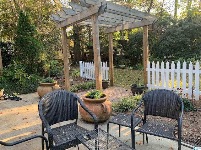 view of patio / terrace with fence and a pergola