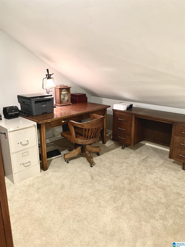 office area with vaulted ceiling and carpet floors