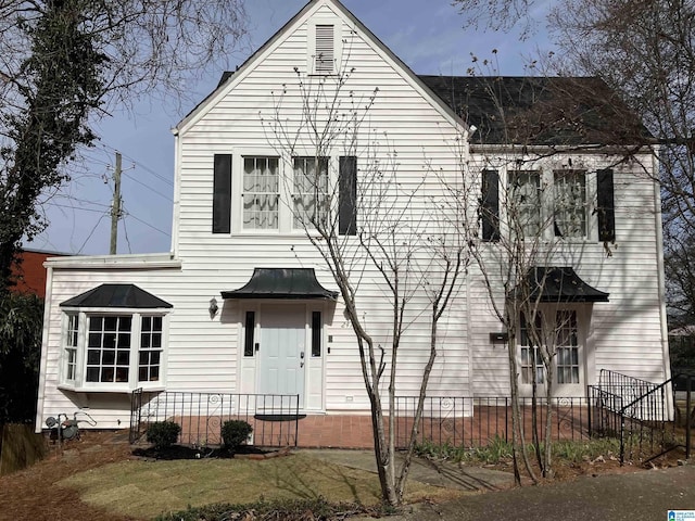 view of front of home with fence