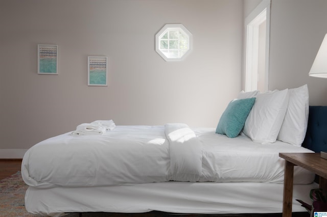 bedroom featuring wood finished floors