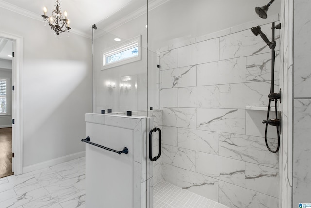 full bath featuring marble finish floor, a notable chandelier, a marble finish shower, ornamental molding, and baseboards