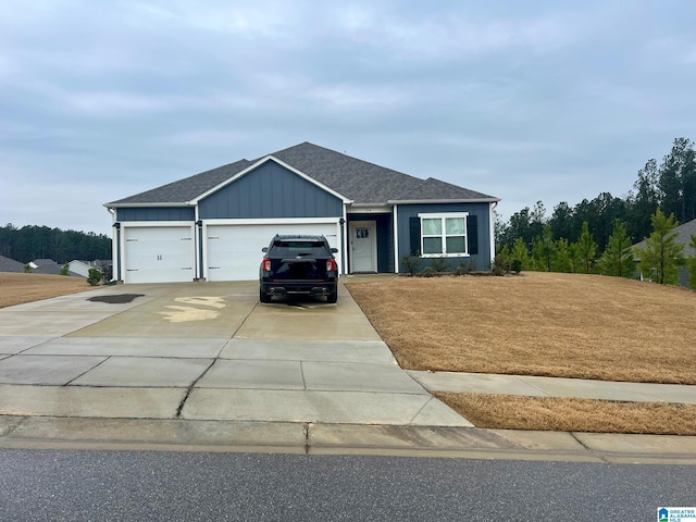 view of front of house with a garage, board and batten siding, and concrete driveway