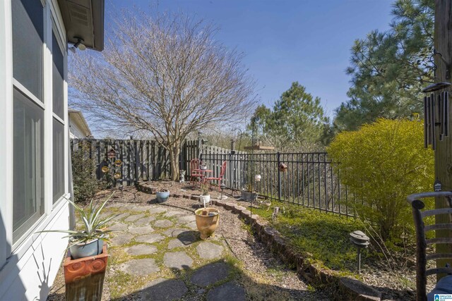 view of yard featuring a fenced backyard