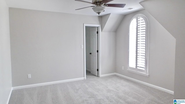 interior space with baseboards, carpet, visible vents, and a healthy amount of sunlight