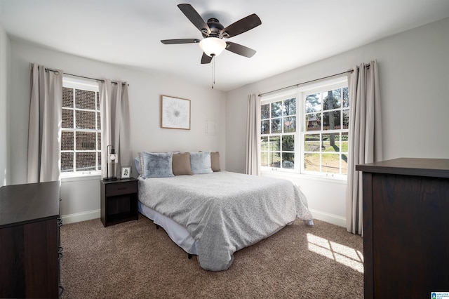 bedroom featuring a ceiling fan, baseboards, and carpet flooring