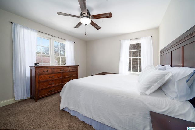 bedroom with ceiling fan and carpet flooring