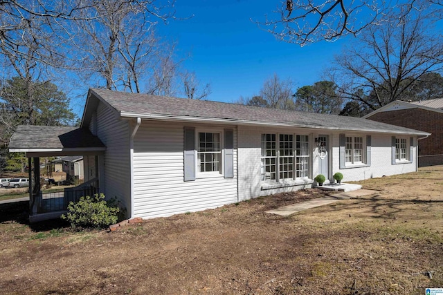 ranch-style house with brick siding