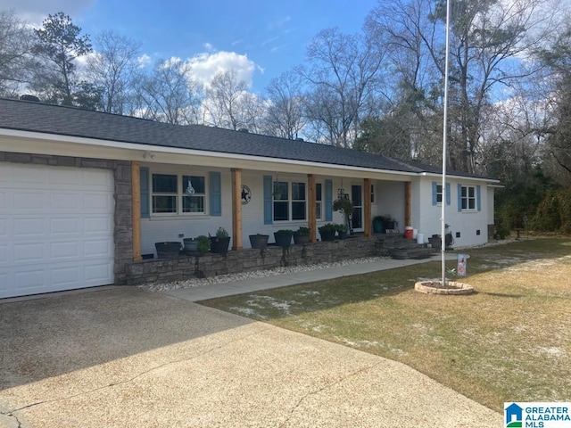 ranch-style house featuring roof with shingles, covered porch, an attached garage, driveway, and a front lawn