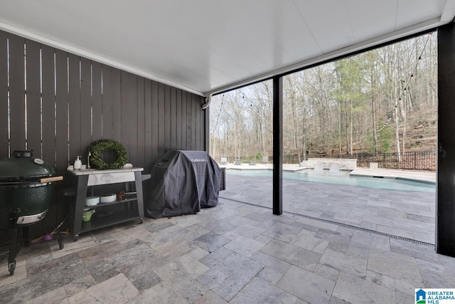 unfurnished sunroom featuring a healthy amount of sunlight