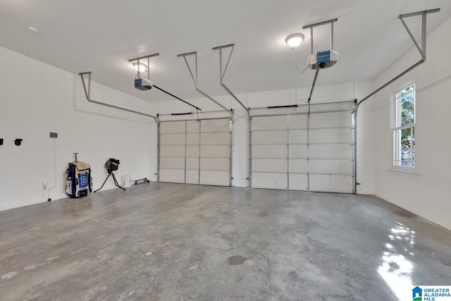 garage featuring a garage door opener