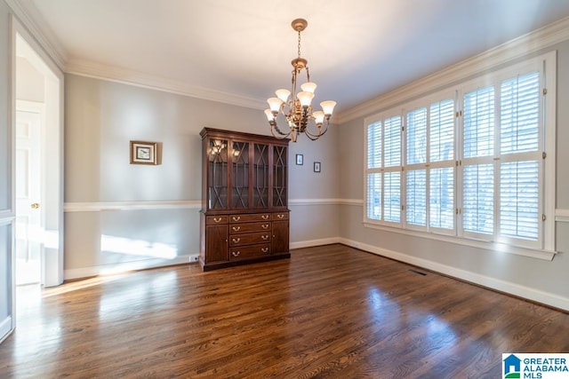 interior space featuring baseboards, visible vents, dark wood-style floors, ornamental molding, and an inviting chandelier