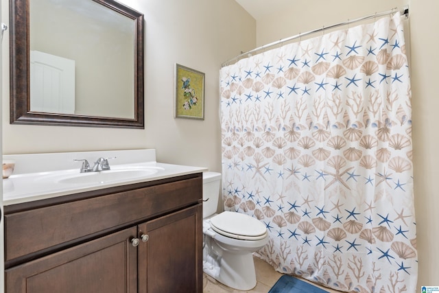 bathroom with tile patterned flooring, curtained shower, toilet, and vanity