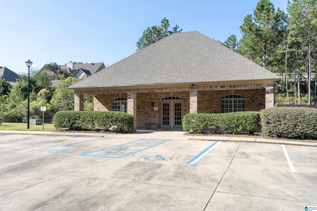 view of property with uncovered parking