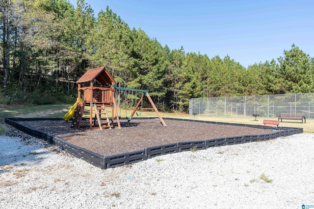 community play area featuring fence