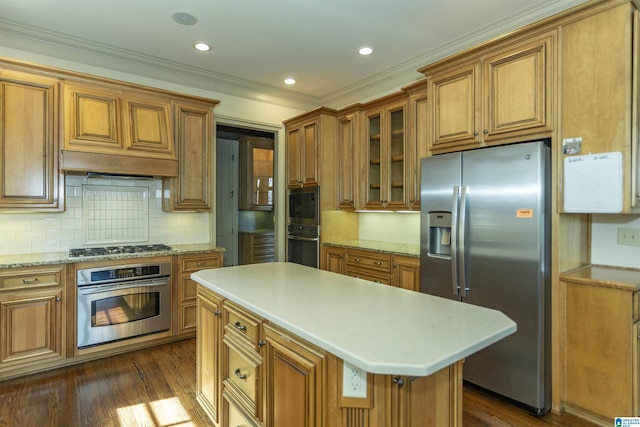 kitchen with stainless steel appliances, brown cabinets, glass insert cabinets, and dark wood-type flooring