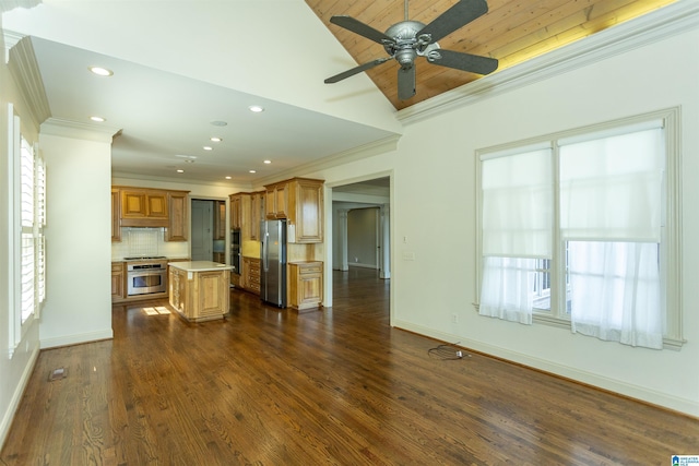 kitchen with dark wood finished floors, decorative backsplash, stainless steel appliances, crown molding, and light countertops