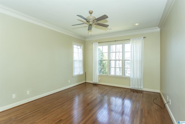 spare room featuring a ceiling fan, crown molding, baseboards, and hardwood / wood-style floors