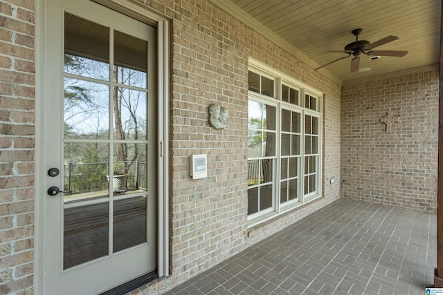 view of patio featuring ceiling fan and a porch