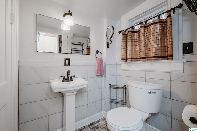 bathroom featuring toilet and a sink