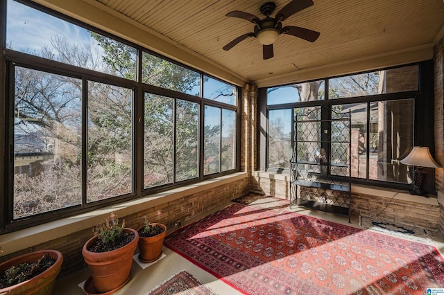 sunroom featuring wood ceiling