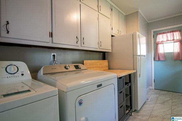 6355 Swann Rd, Mount Olive, AL 35117 - laundry area with ornamental molding, marble finish floor, washing machine and clothes dryer, and laundry area