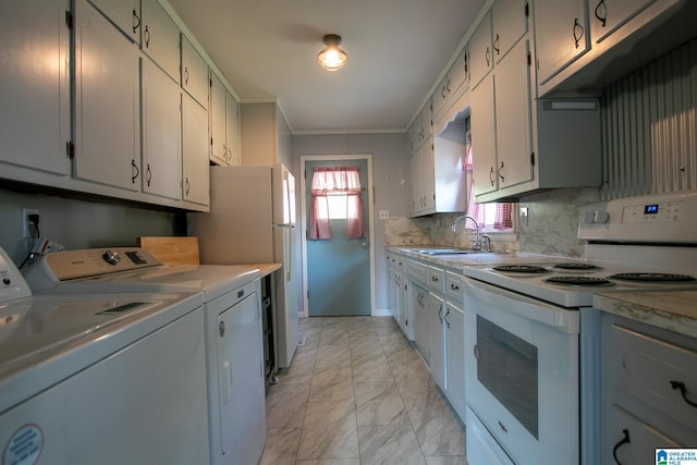 6355 Swann Rd, Mount Olive, AL 35117 - kitchen with white appliances, washing machine and clothes dryer, light countertops, marble finish floor, and a sink