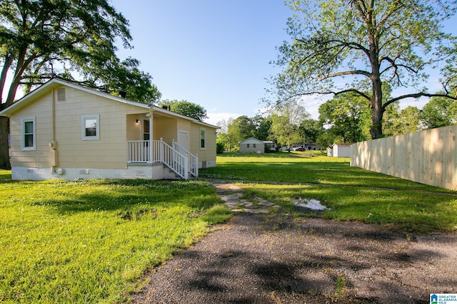 6355 Swann Rd, Mount Olive, AL 35117 - exterior space with fence, a yard, and crawl space