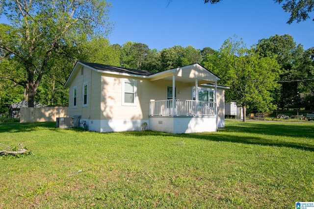 6355 Swann Rd, Mount Olive, AL 35117 - view of front of house featuring a front yard, crawl space, central AC, and covered porch