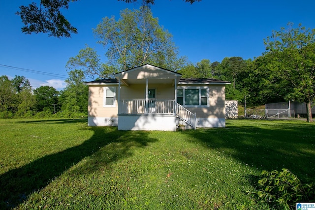 6355 Swann Rd, Mount Olive, AL 35117 - rear view of house featuring covered porch, a yard, and crawl space