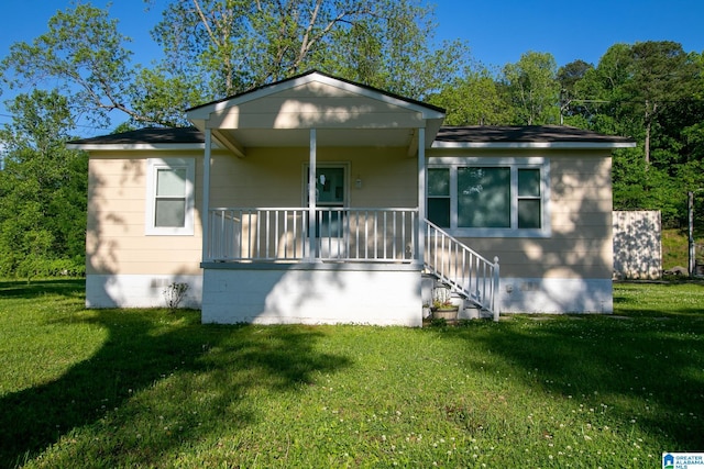 6355 Swann Rd, Mount Olive, AL 35117 - view of front of home with a porch, a front lawn, and crawl space