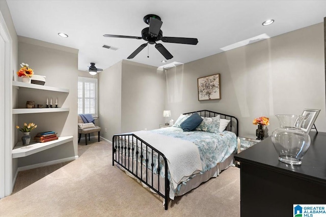 carpeted bedroom featuring recessed lighting, visible vents, ceiling fan, and baseboards