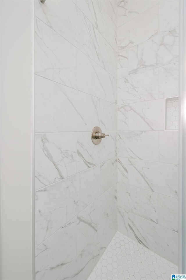 interior details with a shower stall