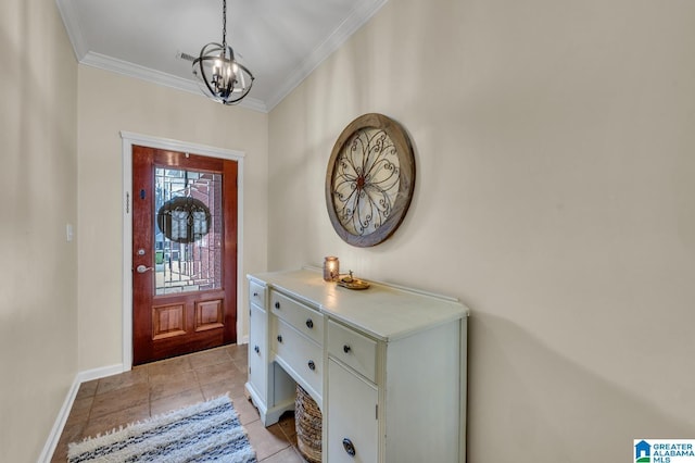 foyer with light tile patterned floors, a notable chandelier, crown molding, and baseboards