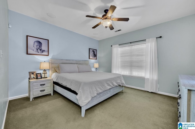 bedroom featuring baseboards, carpet floors, and ceiling fan