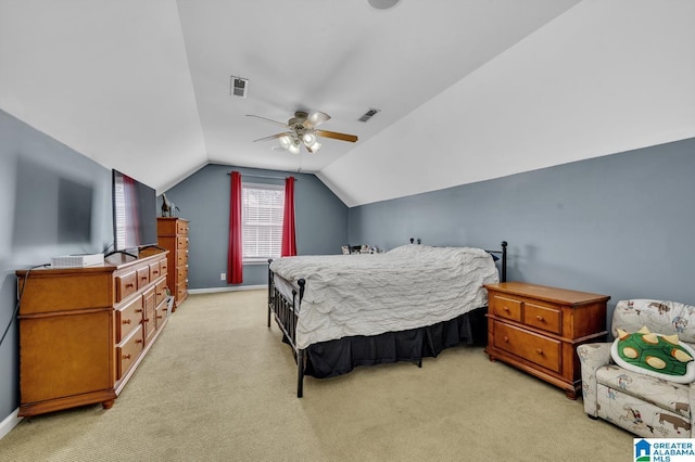 bedroom featuring light carpet, visible vents, a ceiling fan, and vaulted ceiling