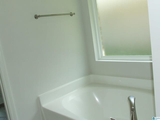 bathroom featuring a bath