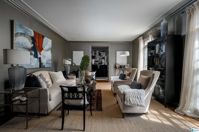 living room with ornamental molding