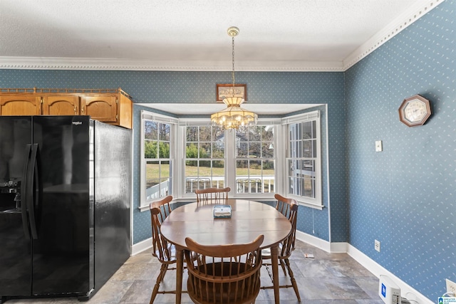 dining area with baseboards and wallpapered walls