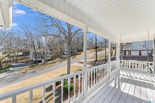 wooden terrace with a porch