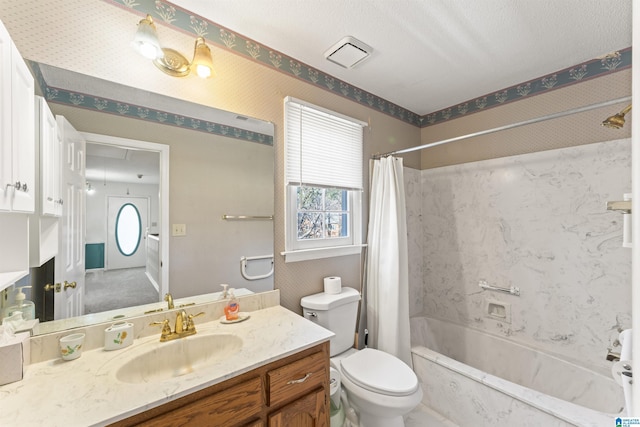 bathroom featuring toilet, shower / tub combo, visible vents, vanity, and wallpapered walls