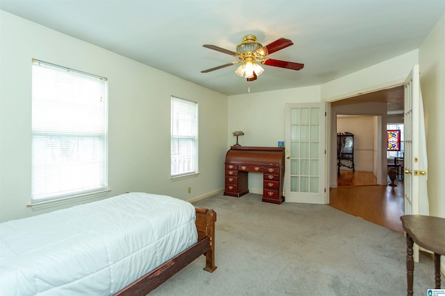 bedroom featuring carpet floors and a ceiling fan