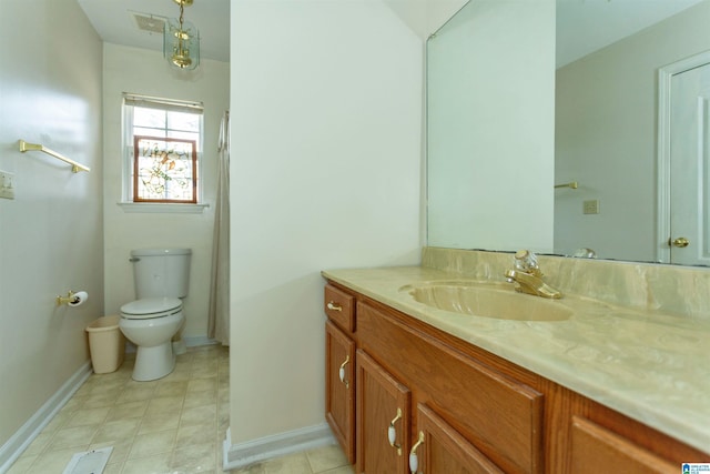 full bath with visible vents, baseboards, vanity, and toilet