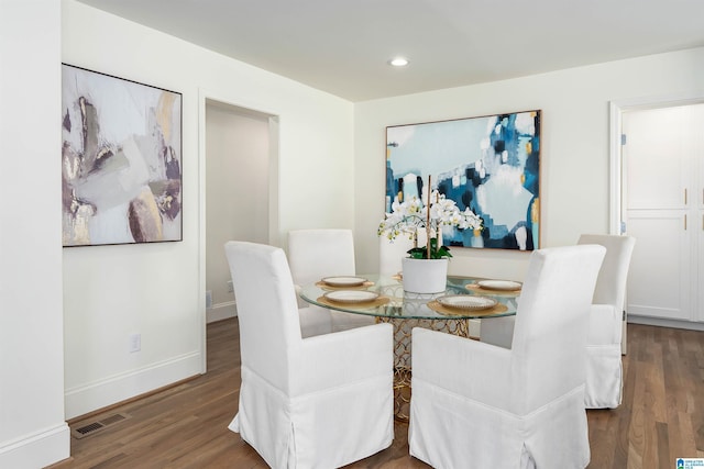 dining area featuring recessed lighting, wood finished floors, visible vents, and baseboards