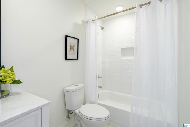 bathroom featuring vanity, toilet, and shower / bathtub combination with curtain