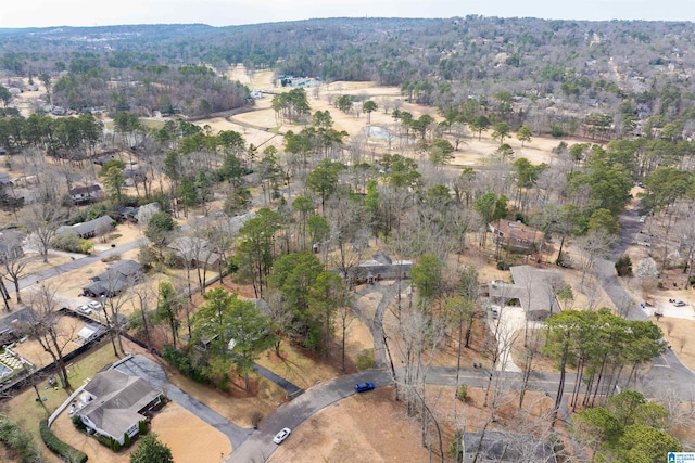 aerial view with a wooded view