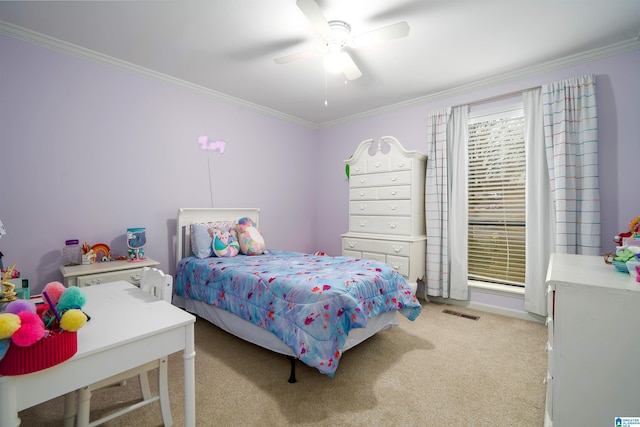 bedroom with light carpet, a ceiling fan, visible vents, and crown molding